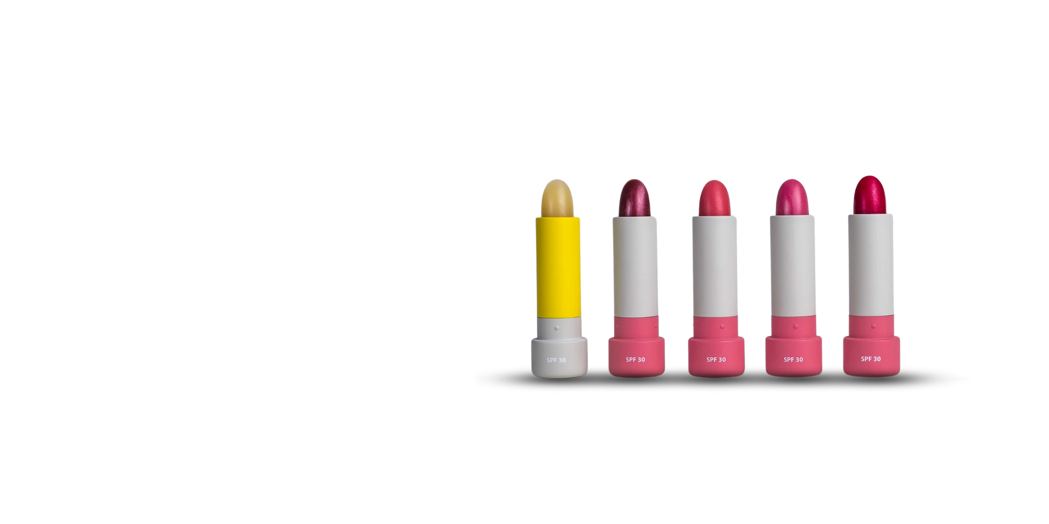 Five lipsticks in a row; one is yellow, the others are varying shades of pink.