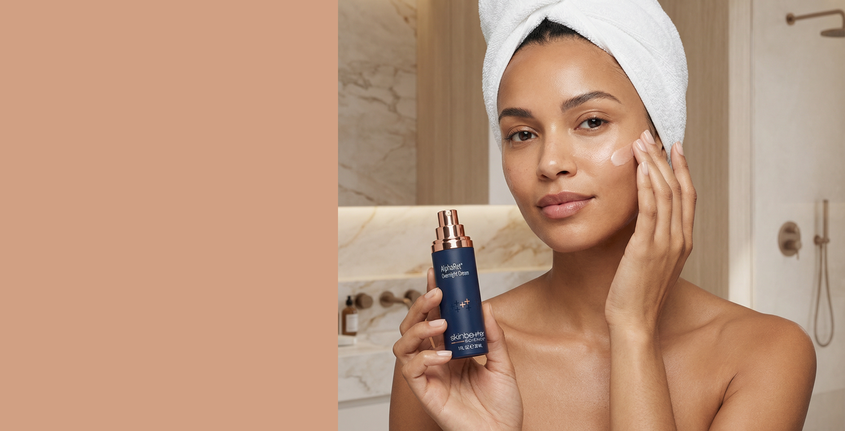 A selection of skincare products from Skinbetter Science displayed on geometric stands against a two-tone background. The arrangement includes bottles and boxes in navy and white packaging with gold accents.