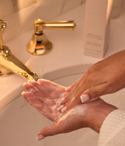 Cascata Detox + Restore Scalp Shampoo lifestyle hand model and texture product


