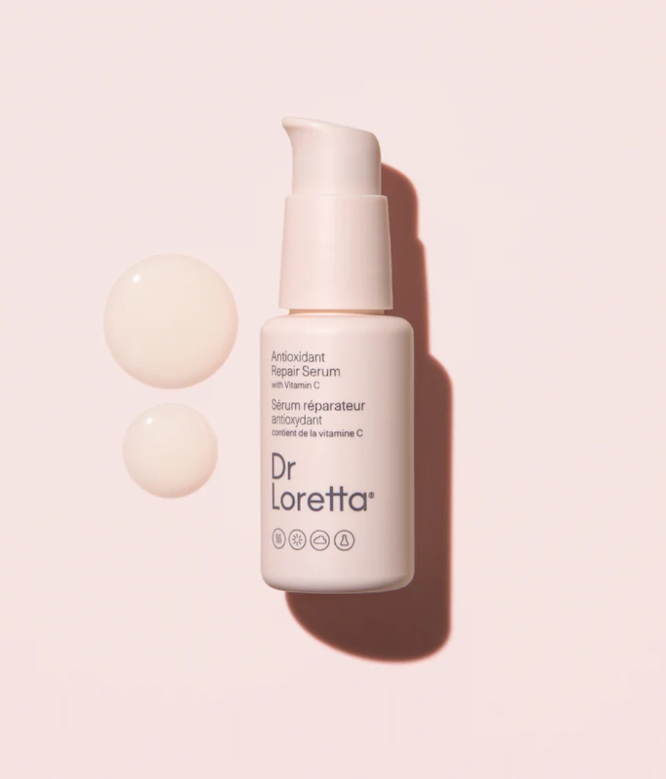 Dr. Loretta Anti-Aging Repair Serum 30ml product shot with texture background
