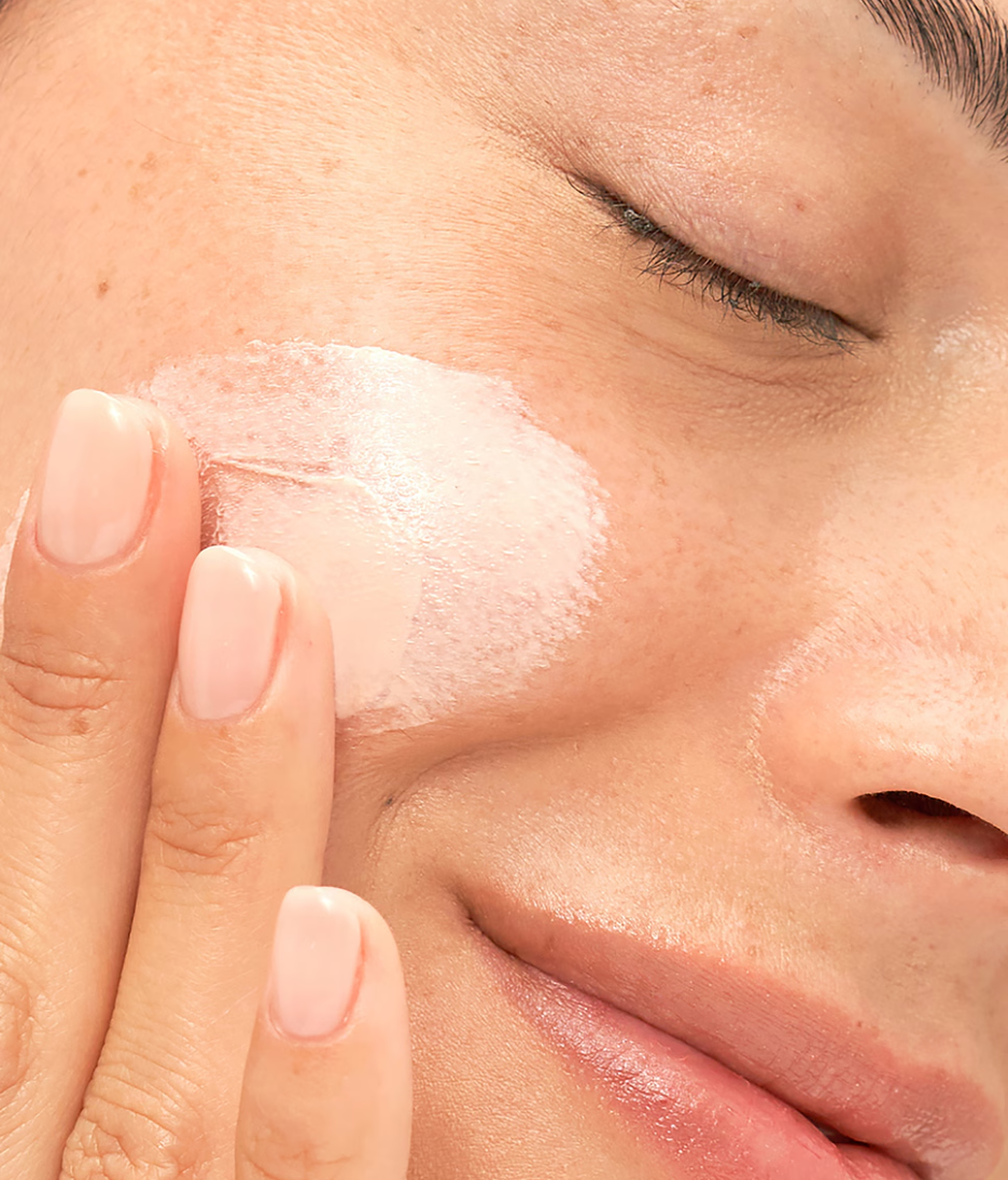 Dr. Loretta Urban Antioxidant Sunscreen SPF40 model close up face and product application