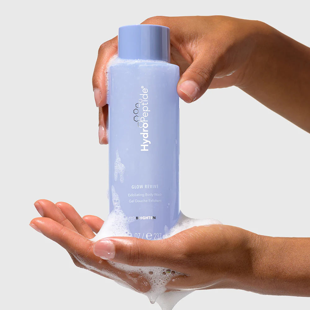 Hydropeptide_GlowReviveExBodyWash_BottleHands.webp