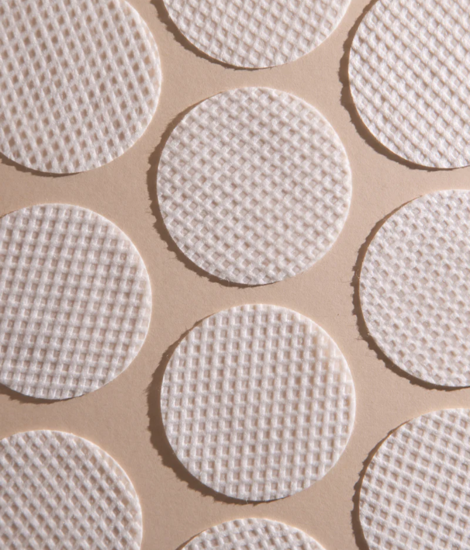 Dr. Loretta Micro Peel Peptide Pads lifestyle image with pads