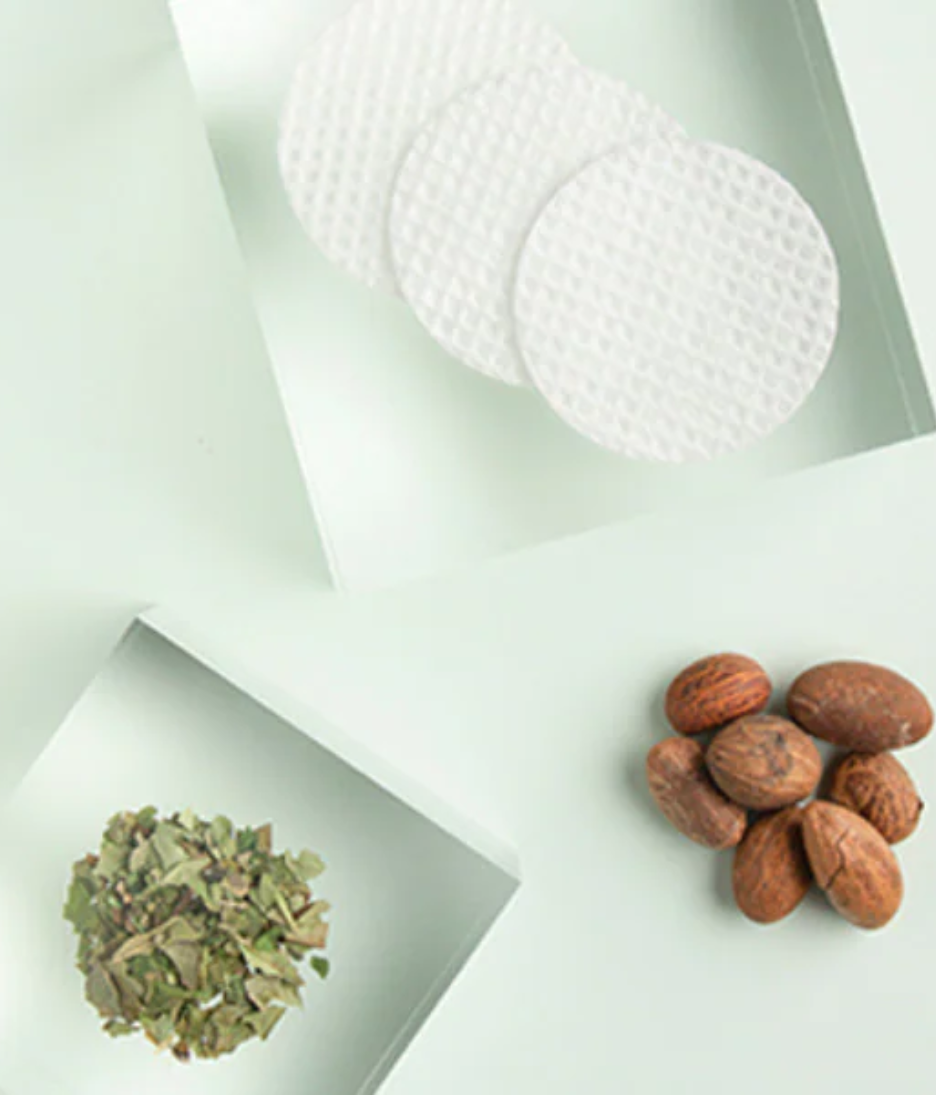 Dr. Loretta Micro Peel Peptide Pads lifestyle image with pads and ingredients
