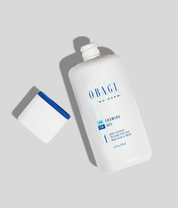 Obagi Nu-Derm foaming gel bottle on a light gray background