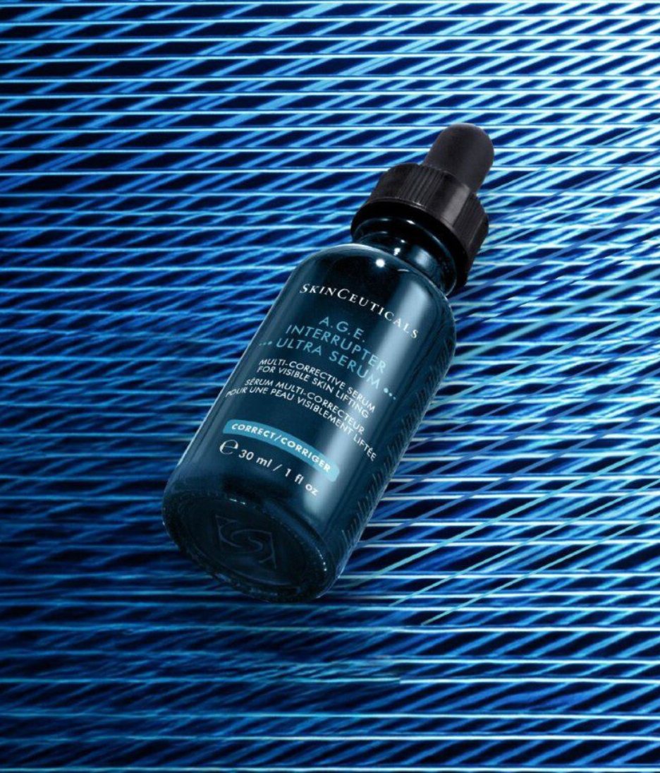 Skinceuticals A.G.E Interrupter Ultra Serum blue textured background
