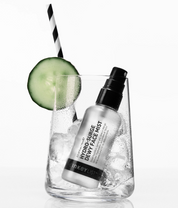 The Inkey List Hydro Surge Dewy Face Mist lifestyle image in glass of ice